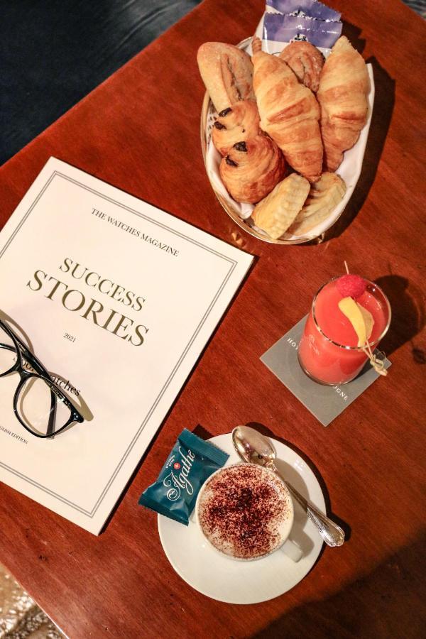 Hotel De La Cigogne Geneva Bagian luar foto Success Stories Magazine