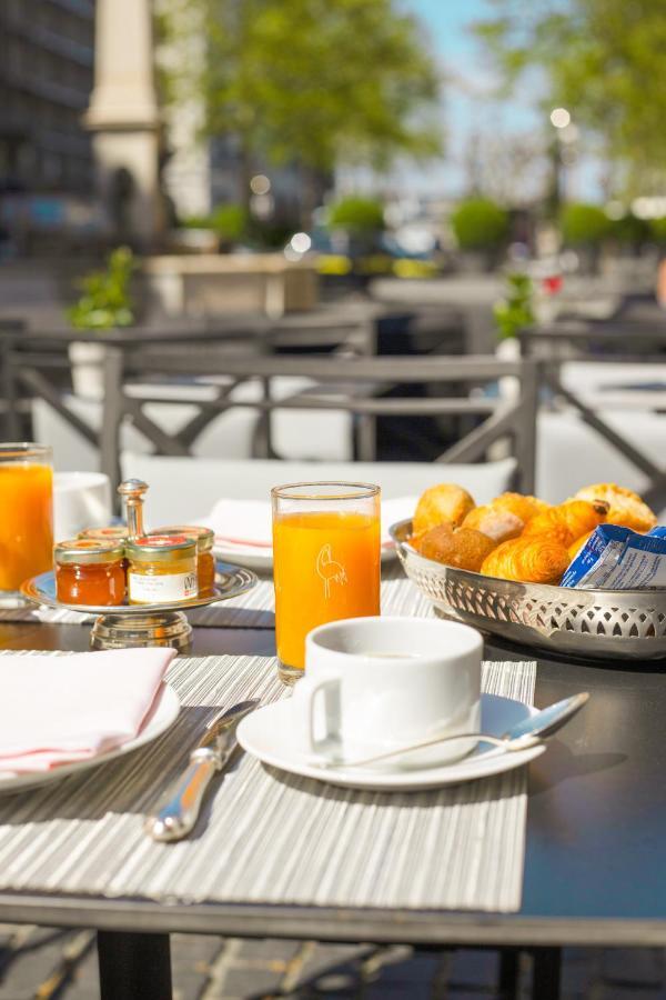 Hotel De La Cigogne Geneva Bagian luar foto Breakfast at the hotel