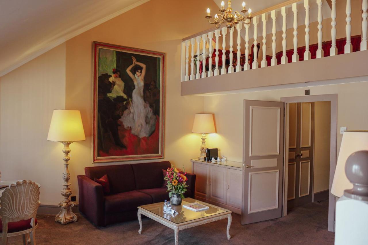 Hotel De La Cigogne Geneva Bagian luar foto A suite at the Hotel de l'Europe