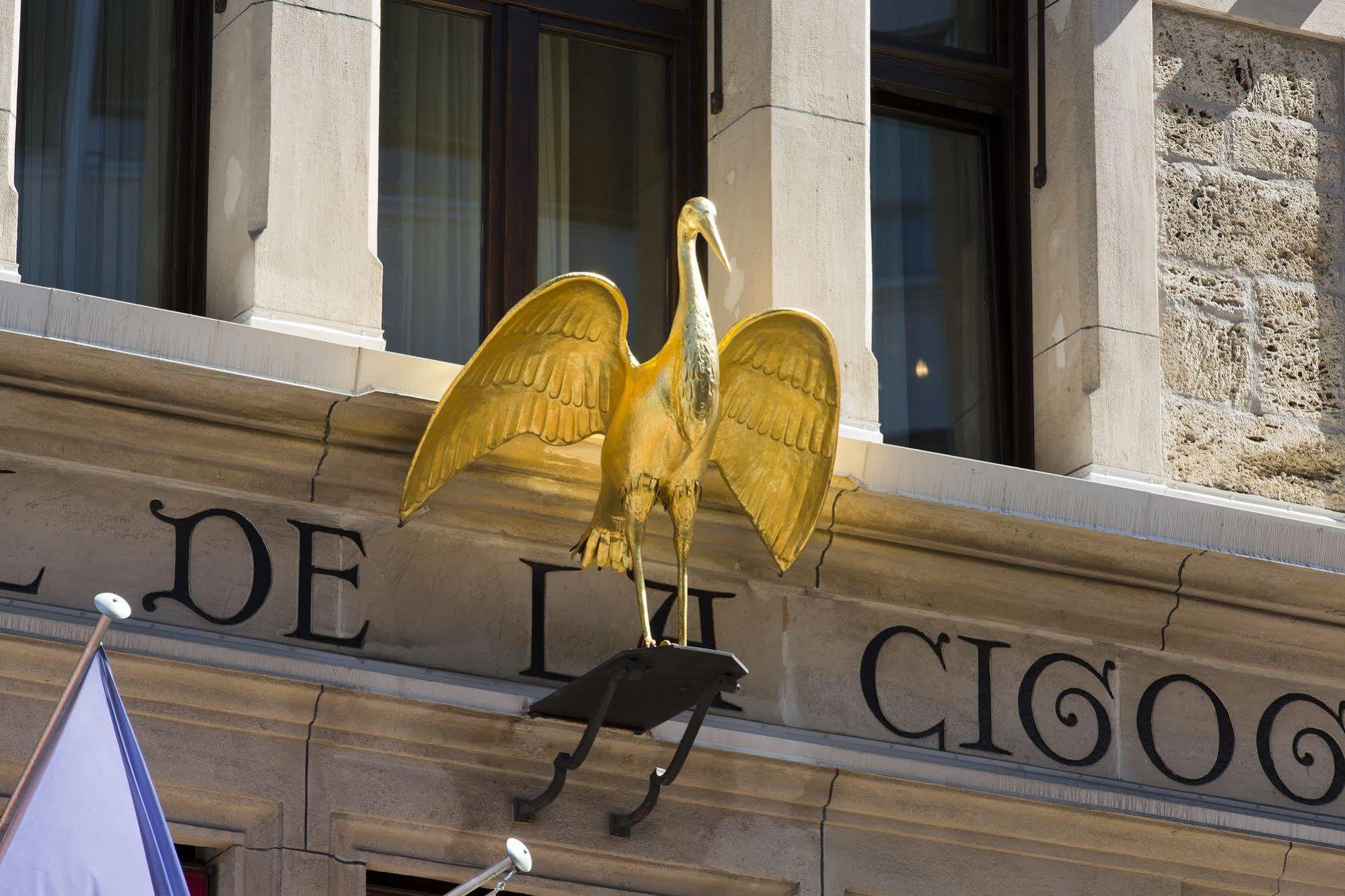 Hotel De La Cigogne Geneva Bagian luar foto The golden stork
