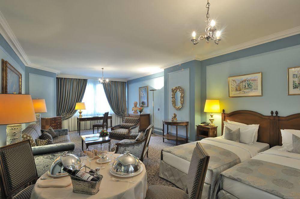 Hotel De La Cigogne Geneva Bagian luar foto Suite