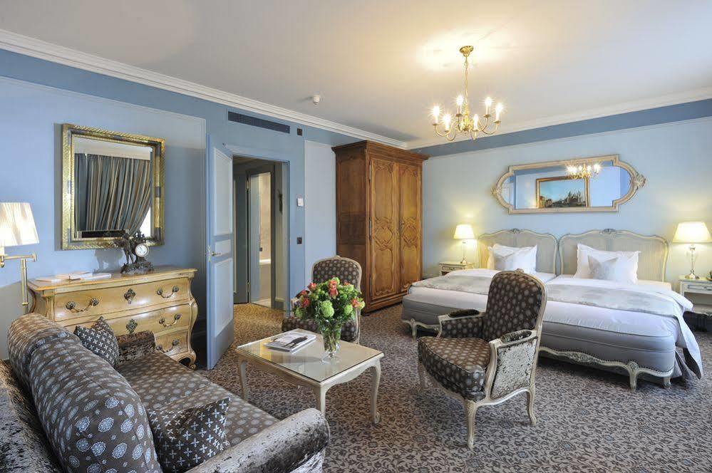 Hotel De La Cigogne Geneva Bagian luar foto Suite